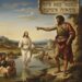 John the Baptist stands on a riverbank pointing toward Jesus, who walks toward him through the water as a group of people watches from the shore.